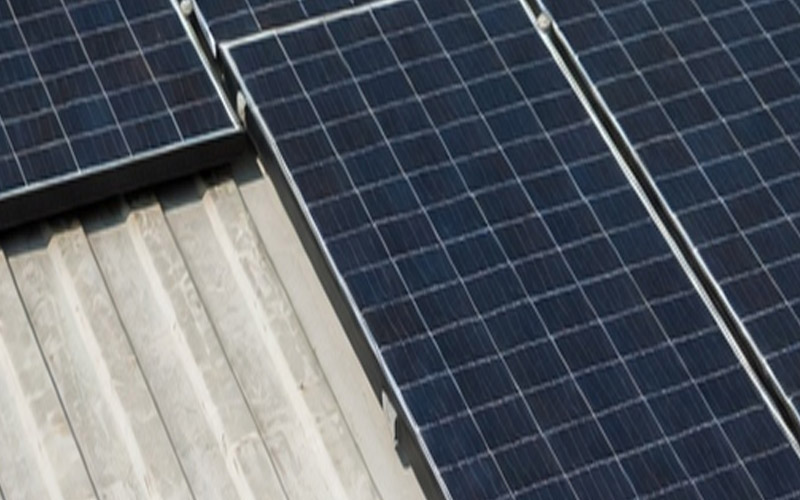 Solar panels mounted on a Micro-Hangar container roof for off-grid power